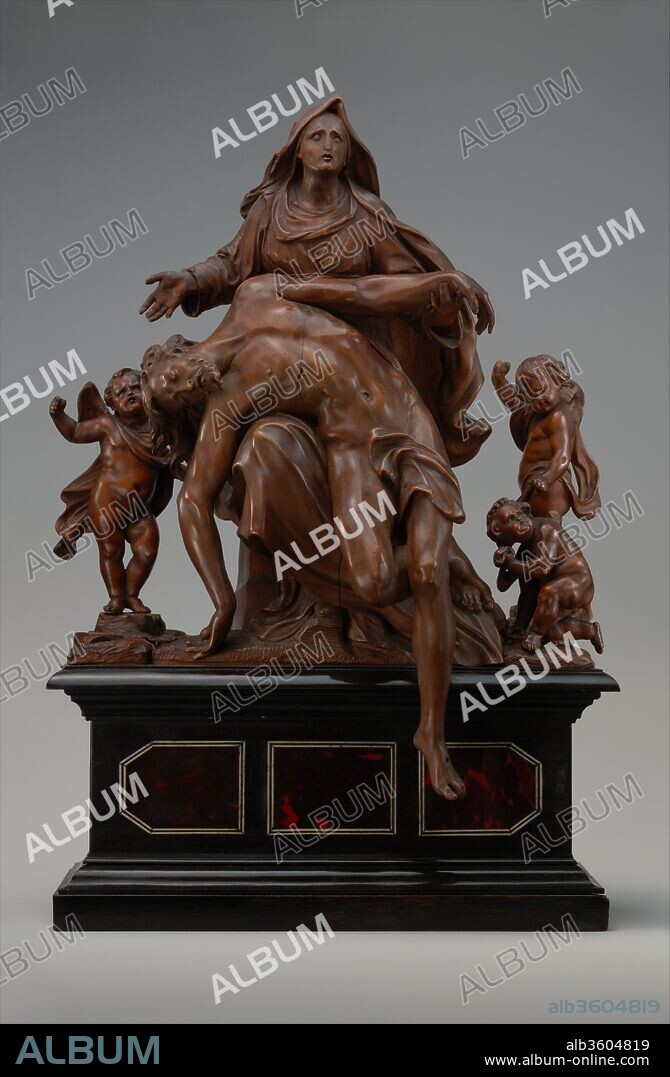 Pietà with Sorrowing Angels. Artist: Workshop of Mattheus van Beveren (Flemish, Antwerp ca. 1630-1690 Brussels). Culture: Flemish. Dimensions: Overall (with base): 18 × 12 1/2 × 6 1/2 in. (45.7 × 31.8 × 16.5 cm). Date: 17th century.
Van Beveren also worked in ivory (see 1980.220) and carved larger wood and marble compositions for wealthy religious orders in Antwerp. The monumentality of this Lamentation derives from the sculptor's full-scale version of 1668, made for the altar of Our Lady of the Seven Sorrows in Dendermonde (now Belgium). A cutout on the back of the base indicates that a cross once stood behind the group.