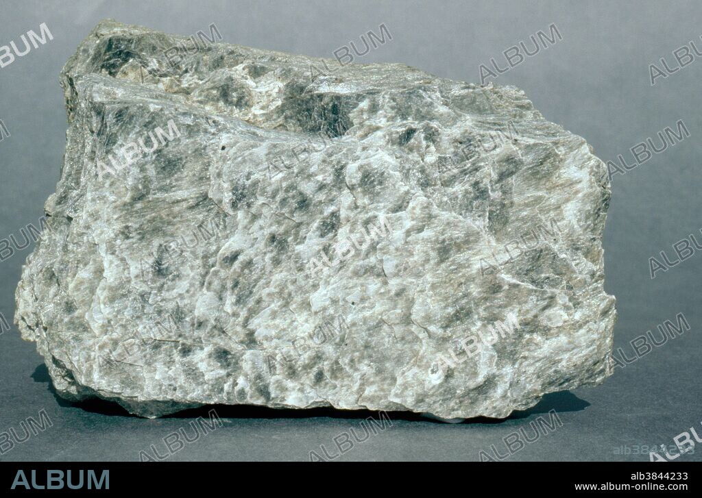 Phyllite, a metamorphic rock. Phyllite is formed by continuing metamorphic pressure on slate. Even more pressure would produce a schist. This sample of phyllite is from Tasmania.