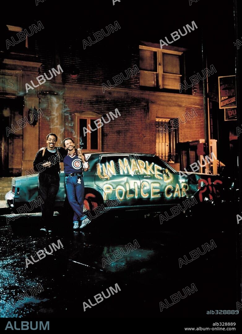 BILLY CRYSTAL and GREGORY HINES in RUNNING SCARED, 1986, directed by PETER HYAMS. Copyright M.G.M / VAUGHAN, STEPHEN.