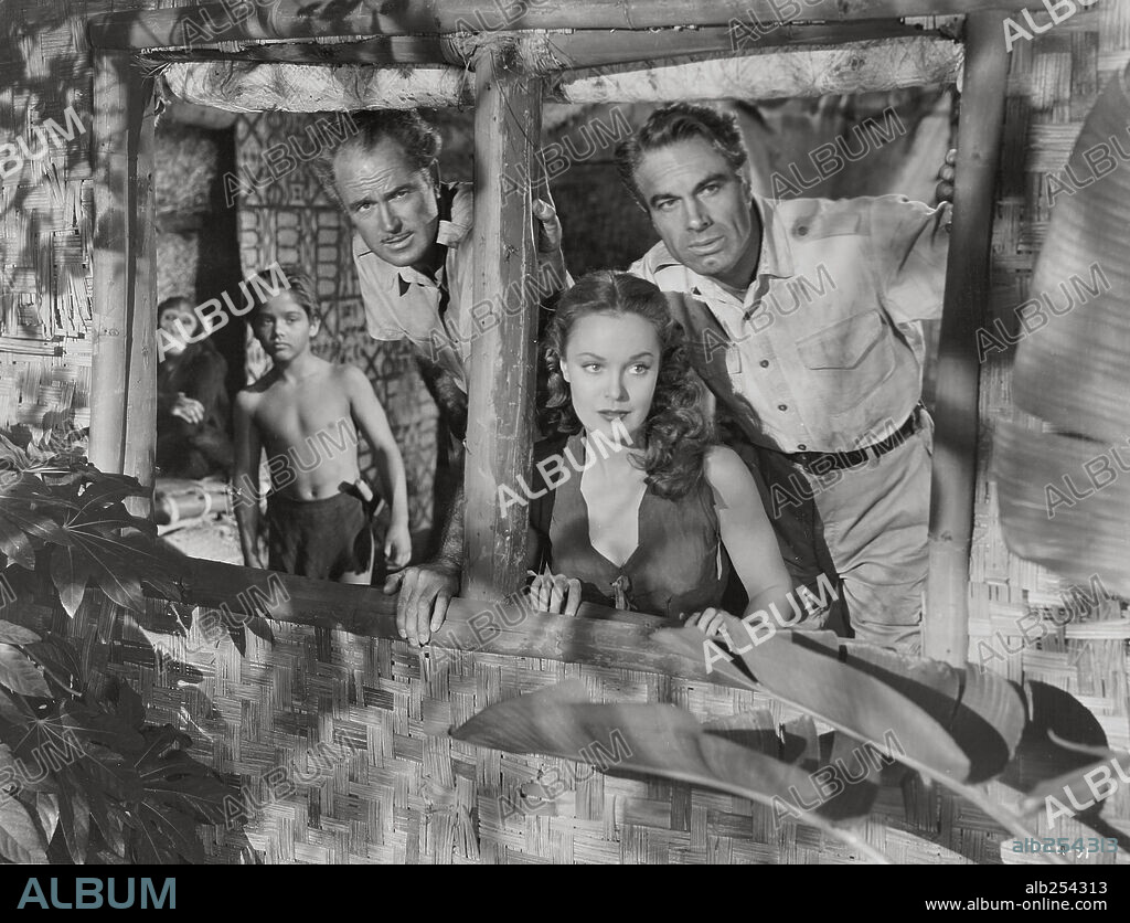 CHARLES KORVIN, DOROTHY HART and TOMMY CARLTON in TARZAN'S SAVAGE FURY, 1952, directed by CY ENDFIELD. Copyright RKO.