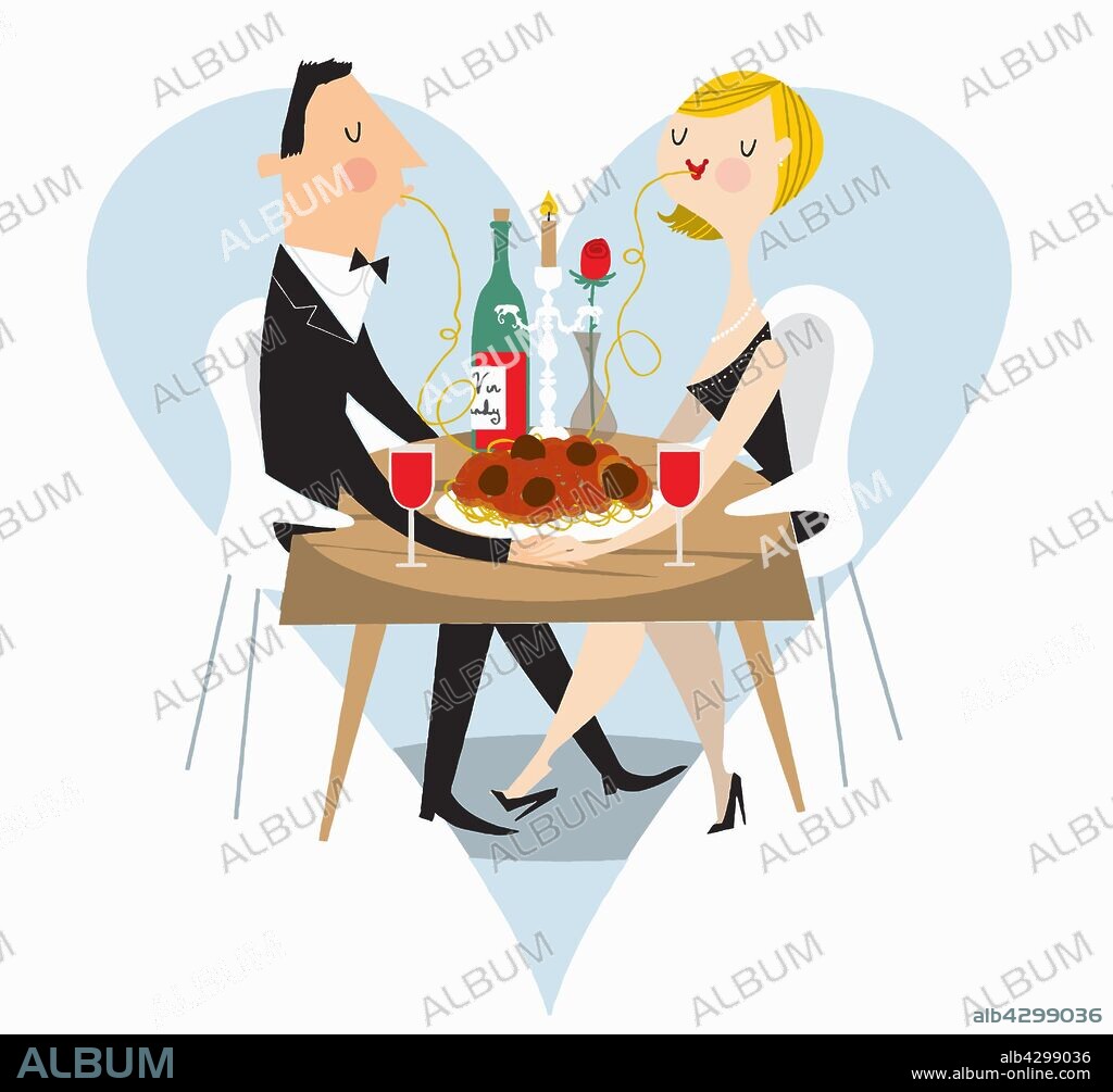 Couple sharing spaghetti at romantic meal.
