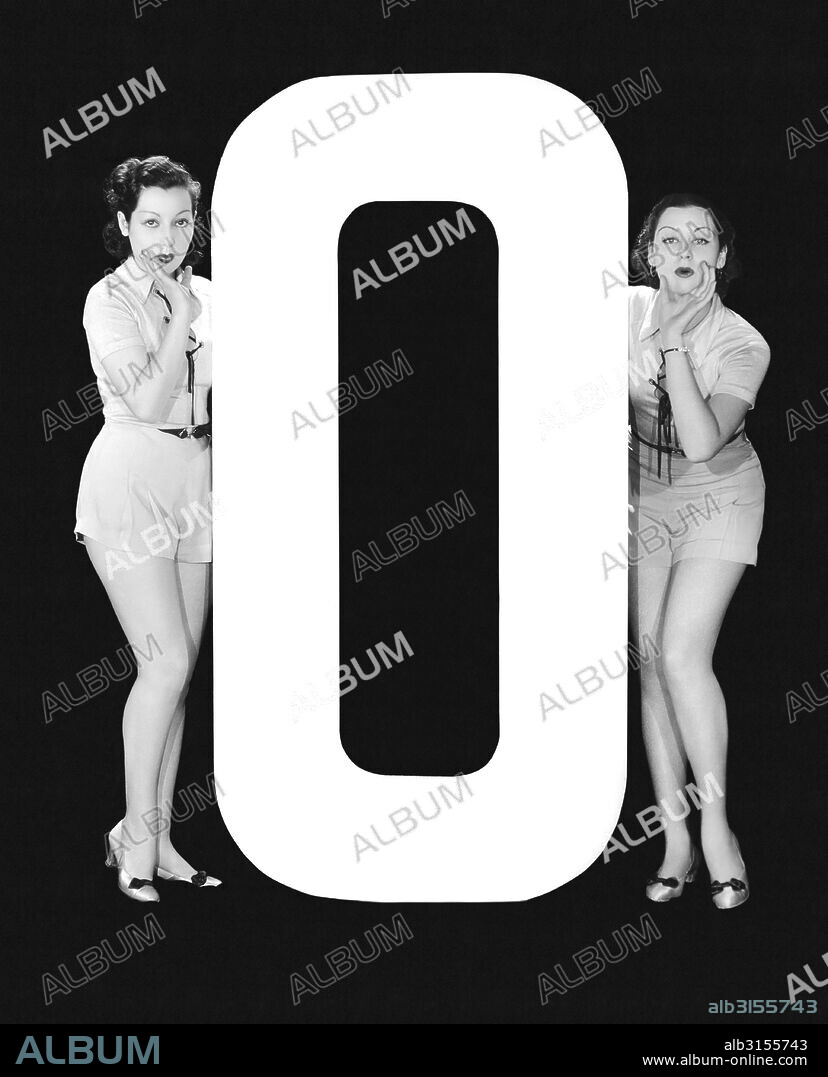 Hollywood, California:  c. 1935. The letter 'O' accompanied by two attractive young women.