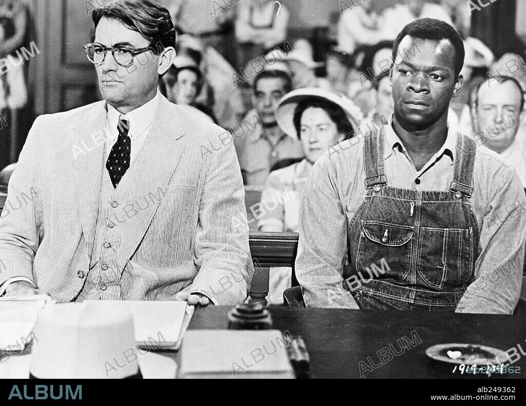 BROCK PETERS and GREGORY PECK in TO KILL A MOCKINGBIRD, 1962, directed by ROBERT MULLIGAN. Copyright UNIVERSAL PICTURES.