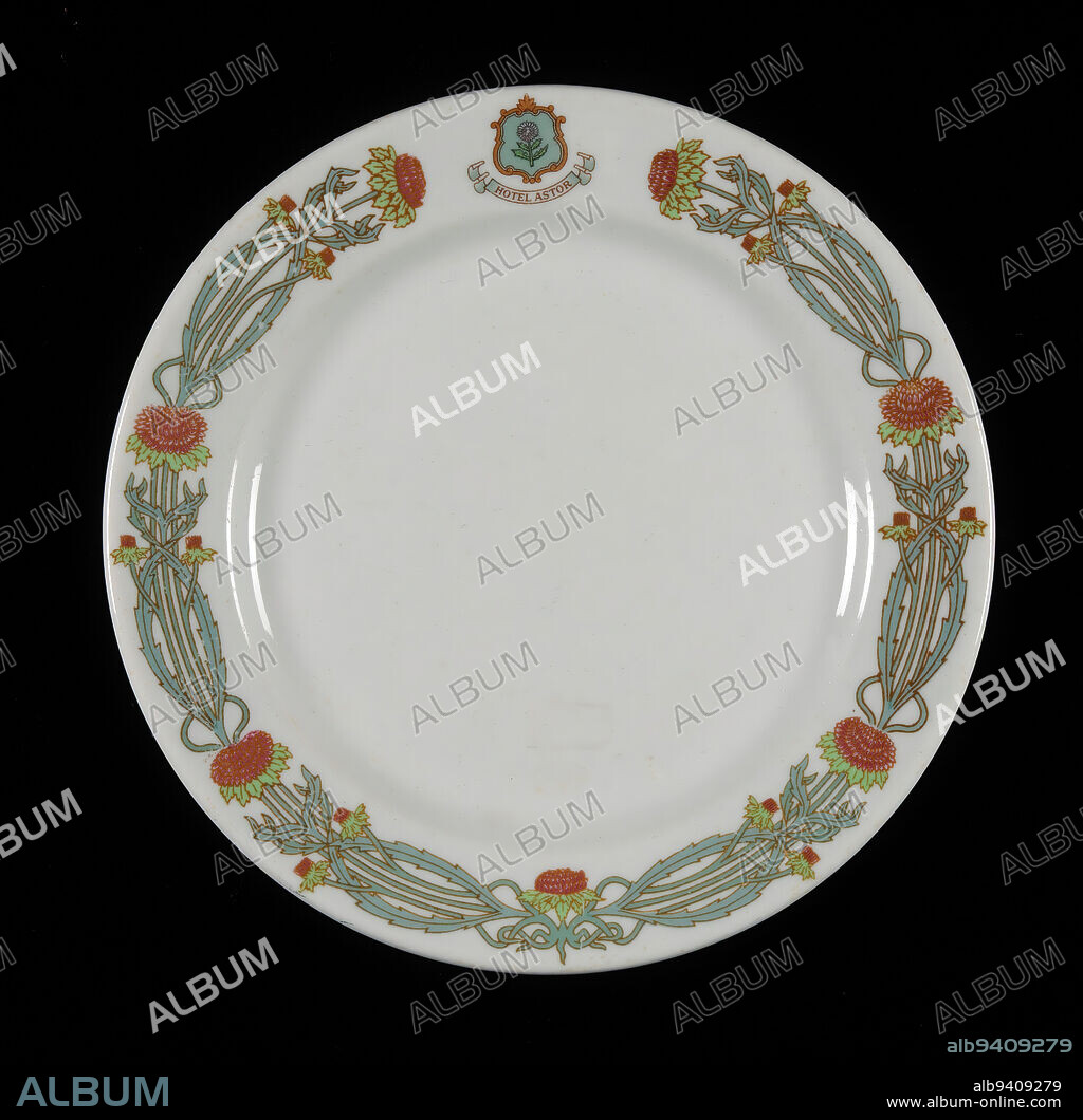 Plate from the Hotel Astor, New York City, c. 1905, Buffalo China Co., Buffalo New York, est. 1901, 15/16 x 7 13/16 x 7 13/16 in. (2.38 x 19.84 x 19.84 cm), Earthenware, United States, 20th century, The heavier weight, customized crest, floral rim, and undecorated center of this plate are typical of restaurant services made in upstate New York. Hotel Astor stood between 44th and 45th Streets on Broadway in New York City, advertised as 'Ten Stories of the Latest Luxury.' A 1905 illustration in the New York Times celebrated the hotel's advanced kitchens, well-appointed dining rooms, and wine Vaults. At least one later version of this sunflower motif was designed for the hotel before it was demolished in 1967.