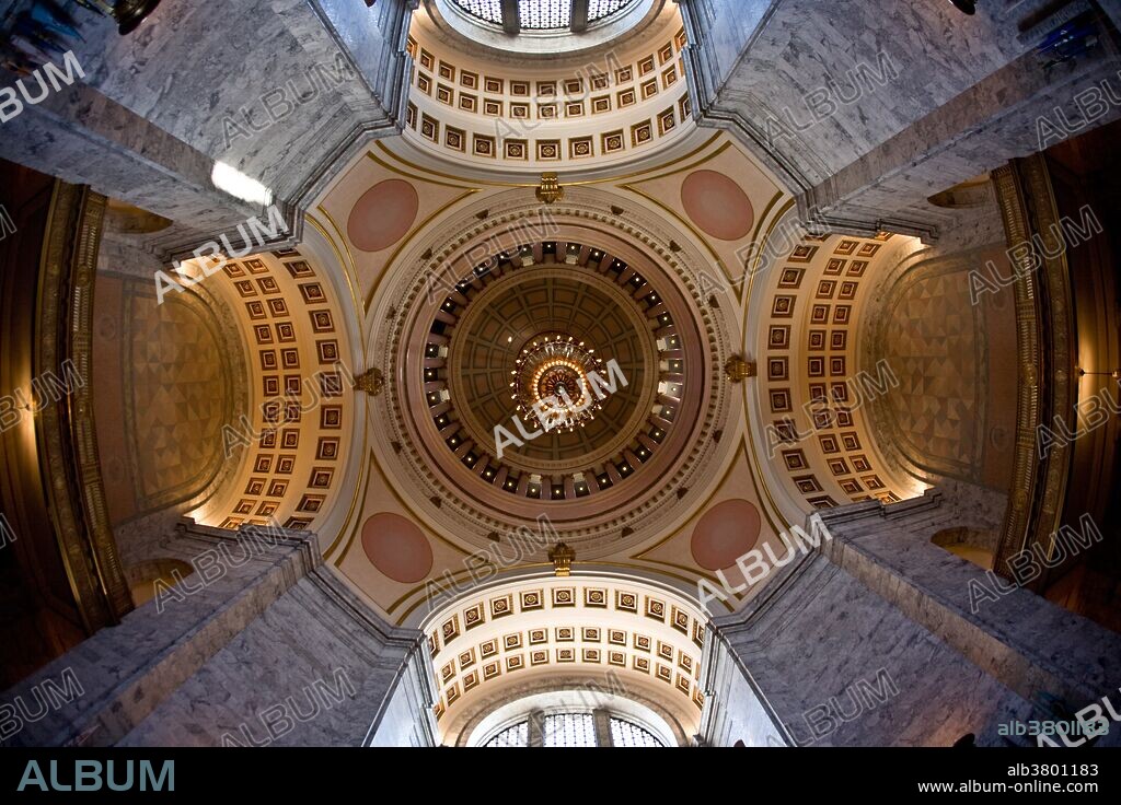 Vertical view of the rotunda of  Washington State's Legislative Building in the city of Olympia. Completed in 1928, it is the centerpiece of five historic buildings designed by architects Walter Wilder and Harry White.