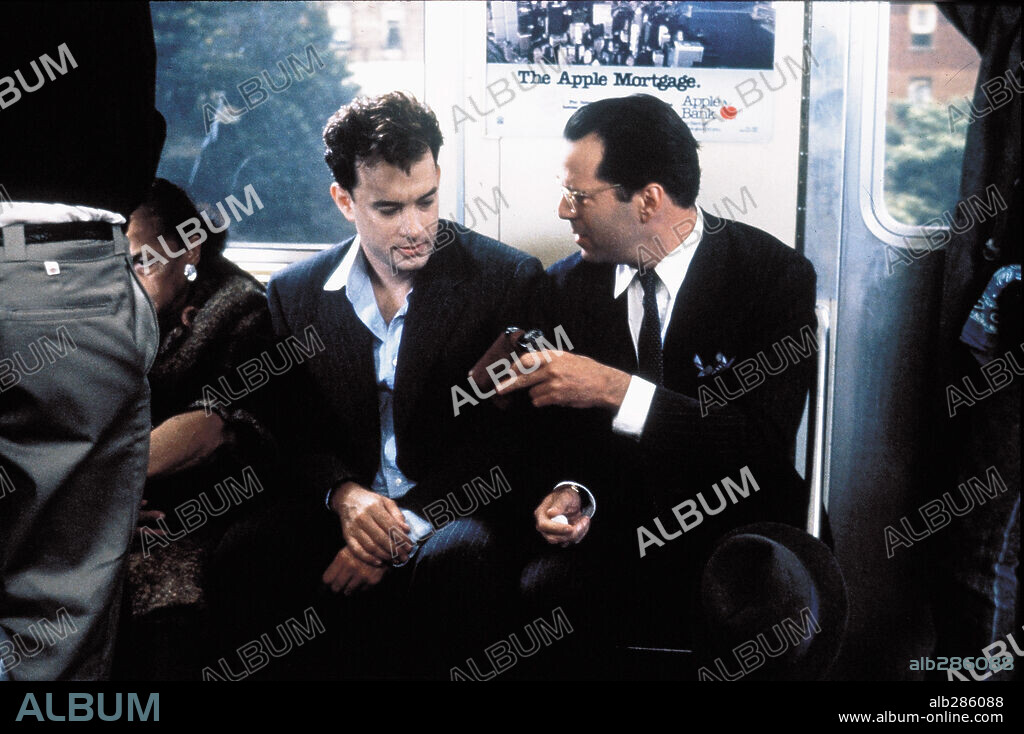 BRUCE WILLIS y TOM HANKS en LA HOGUERA DE LAS VANIDADES, 1990 (THE BONFIRE OF THE VANITIES), dirigida por BRIAN DE PALMA. Copyright WARNER BROTHERS.
