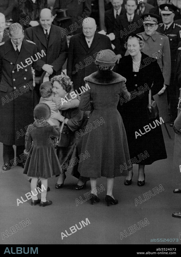 Homecoming's Happiest Moment - Prince Charles has a big hug for his grandmother, the Queen Mother, on Waterloo Station to-day as Princess Anne waits to give her own greeting. At left is the Duke of Edinburgh and at right, the Queen greets a member of the Queen Mother's entourage. Queen Elizabeth the Queen Mother came back to a family welcome, and a big hug form her grandchildren when she returned to London to-day (Wednesday) from her triumphal visit to Canada and the United States.Waiting at Waterloo Station to great her were the Queen, the Duke of Edinburgh, their children, Prince Charles and Princess Anne, and other members of the Royal family.Afterwards, she drove home in semi-State to Clarence House. November 24, 1954. (Photo by Reuterphoto).