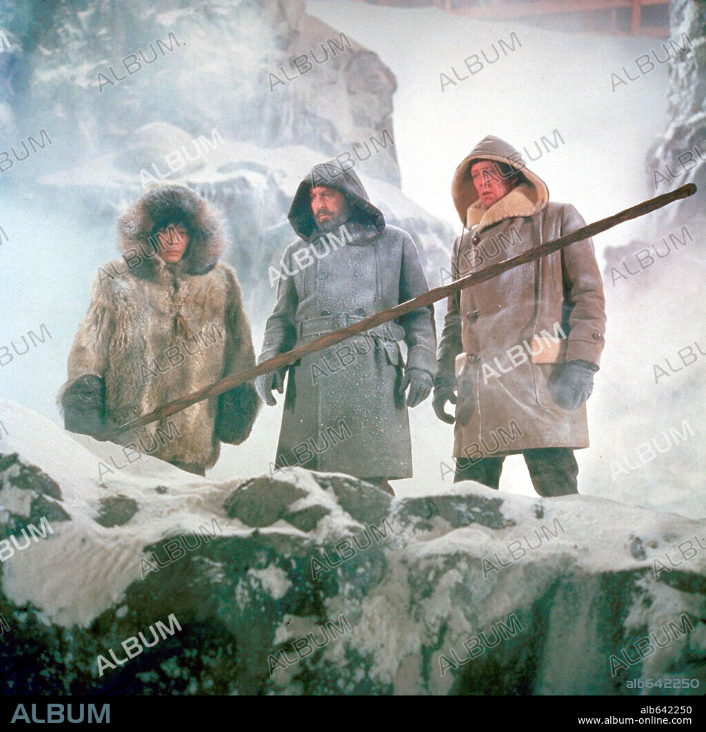 DAVID HARTMAN, DONALD SINDEN and MAKO in THE ISLAND AT THE TOP OF THE WORLD, 1974, directed by ROBERT STEVENSON. Copyright WALT DISNEY PICTURES.