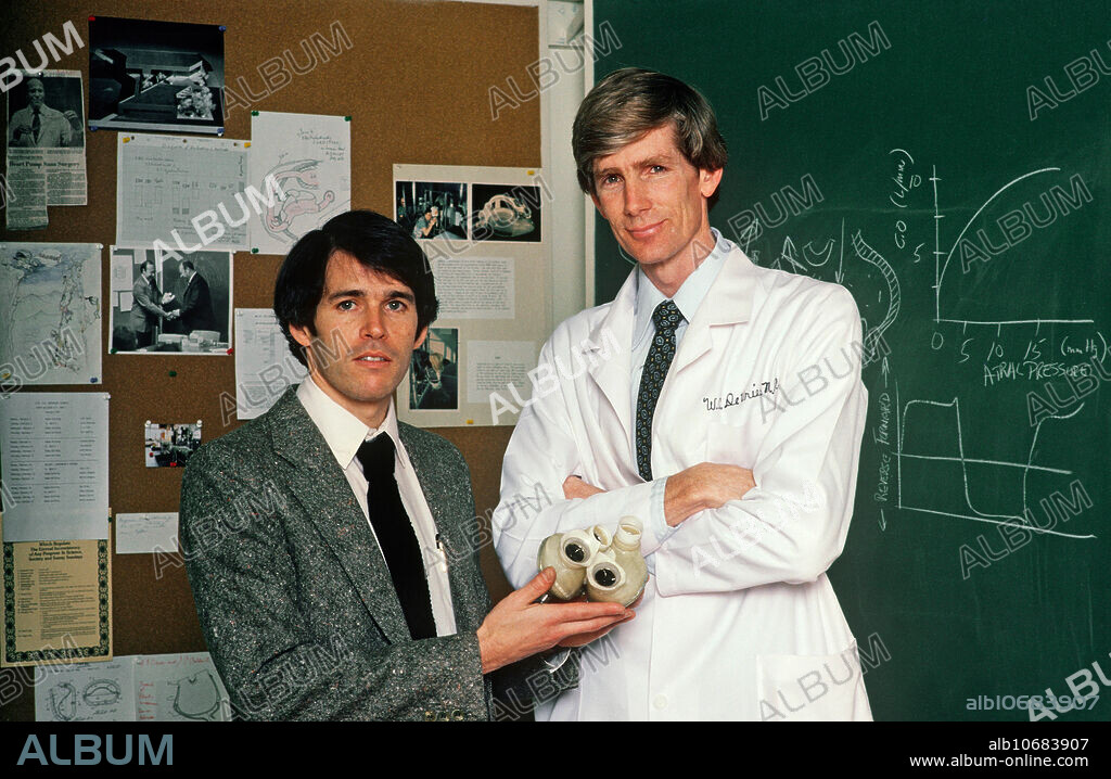 Dr. Robert Jarvik, developer of the Jarvik-7 artificial heart, and William DeVries, surgeon who performed the first successful permanent artificial heart implantation using the Jarvik-7 model.