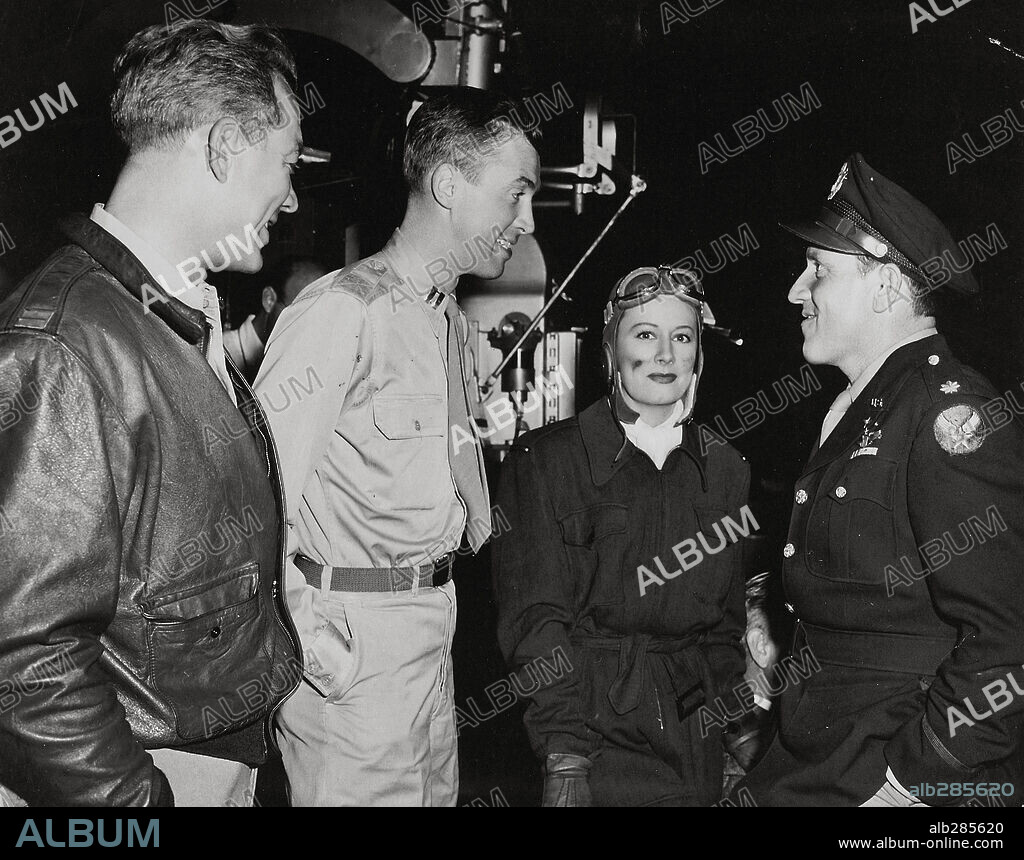 WARD BOND, IRENE DUNNE, TRACY SPENCER and JAMES STEWART. IRENE DUNNE, JAMES STEWART, SPENCER TRACY and WARD BOND in A GUY NAMED JOE, 1943, directed by VICTOR FLEMING. Copyright M.G.M.