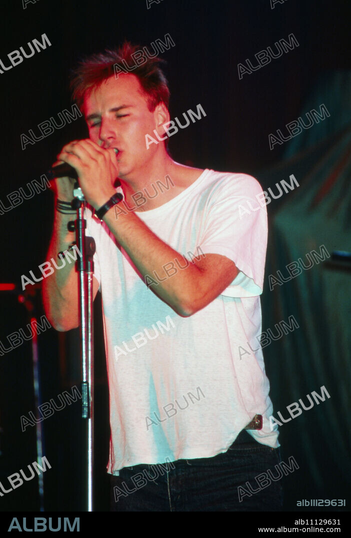 Kai Wingenfelder, singer of the band "Fury in the Slaughterhouse" from Hanover at a concert in Schwerin, Germany 1990. (original german headline: Fury in the Slaughterhouse).