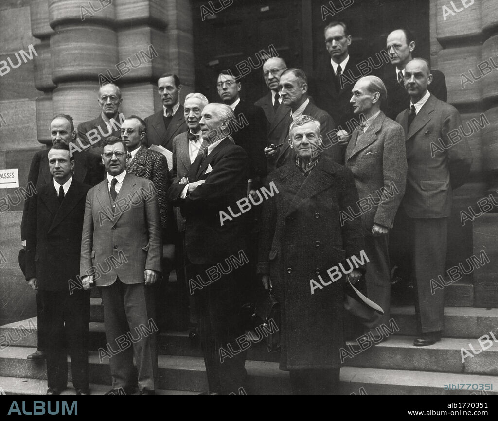 Nazi leaders defending counsels. In the court of the Law Courts, the defending counsels of the Nazi leaders; from the left, in the front row, Egon Kubuschok (von Papen), Robert Servatius (Sauckel and Seysscher), Alfred Seidl (Frank and Hess), Hanns Marx (Streicher); in the second row, Franz Exner (Jodl), Fritz Sauter (Ribbentrop, Funk and Schirach), Otto Stahmer (Goering), WWalter Ballas (Gustav Krupp), Hans Flaechner (Sperr), Gunther von Rohrscheidt (Hess); in the third row, Heinz Fritz (Fritzsche), Otto Pannenbecker (Frick), Alfred Thoma (Rosenberg), Kurt Kauffman (Kaltenbrunner), Hans Laternser (Wehrmacht). Nuremberg, 1945.