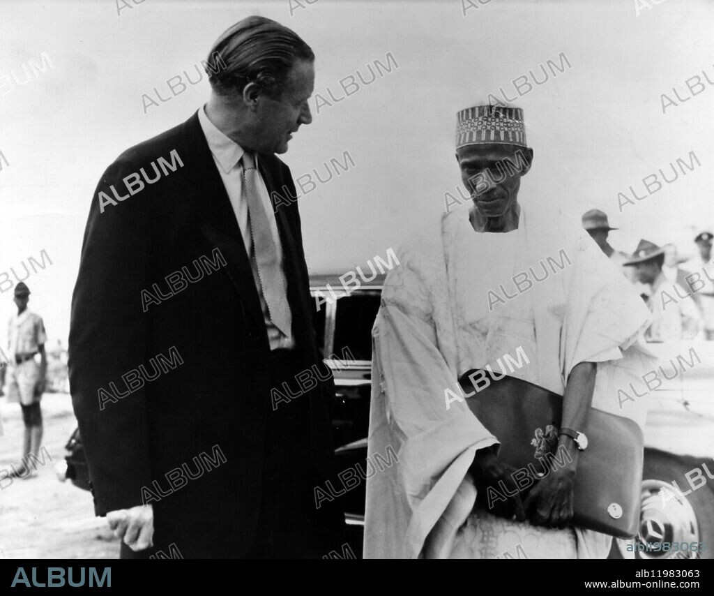 SIERRA LEONE BECOMES INDEPENDENT. Sierra Leone became independent on 27 April 1961. The celebrations started on Friday 21 April, with the Queen's birthday parade and lasts until 1 May 1961. HRH the Duke of Kent is representing the Queen at the celebrations. Picture shows : The Secretary of State for Commonwealth Relations, Mr Duncan Sandys, seen on his arrival in Freetown to attend the Independence celebrations as one of the representatives of the British Government. On his right is the Prime Minister, Sir Milton Margai. 1 May 1961.