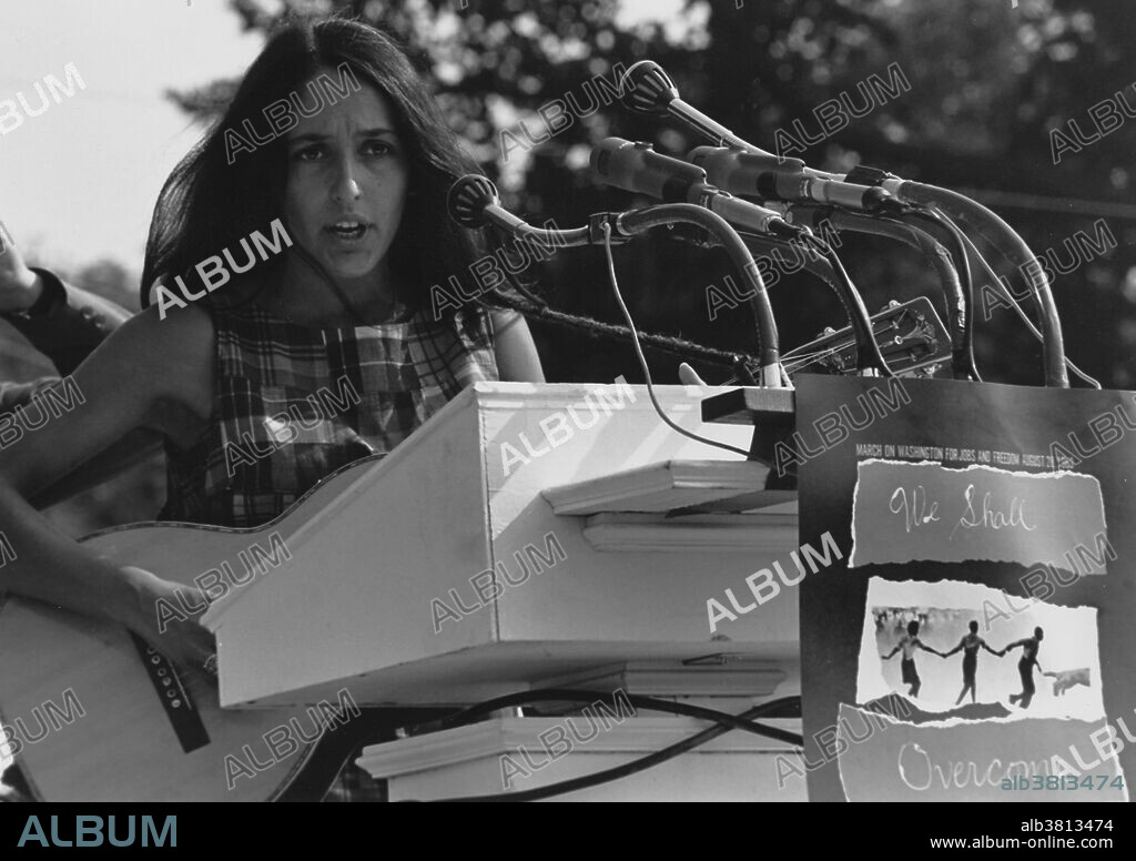 Entitled: "Entertainment: Vocalist Joan Baez. A sign hanging near the microphones reads: We Shall Overcome." The March on Washington for Jobs and Freedom was one of the largest political rallies for human rights in United States history and called for civil and economic rights for African-Americans. On Wednesday, August 28, 1963. Martin Luther King, Jr., standing in front of the Lincoln Memorial, delivered his historic "I Have a Dream" speech in which he called for an end to racism. The march was organized by a group of civil rights, labor, and religious organizations, under the theme "jobs, and freedom". Estimates of the number of participants varied from 200,000 to 300,000; it is widely accepted that approximately 250,000 people participated in the march. Observers estimated that 75-80% of the marchers were black. The march is credited with helping to pass the Civil Rights Act (1964) and preceded the Selma Voting Rights Movement which led to the passage of the Voting Rights Act (1965). Joan Baez (born January 9, 1941) is an American folk singer, songwriter, musician, and activist whose contemporary folk music often includes songs of protest or social justice.