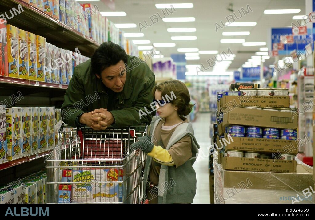 BOBBY COLEMAN y JOHN CUSACK en EL NIÑO DE MARTE, 2007 (MARTIAN CHILD), dirigida por MENNO MEYJES. Copyright NEW LINE CINEMA / MARKFIELD, ALAN.
