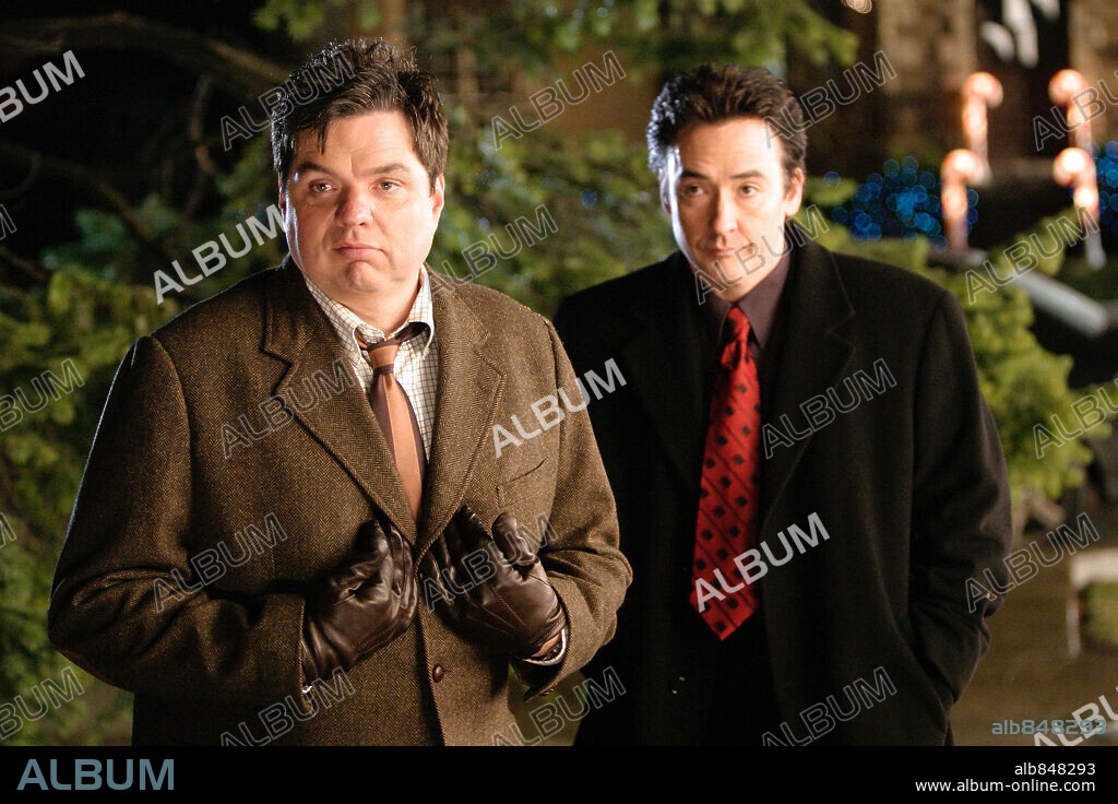 JOHN CUSACK y OLIVER PLATT en LA COSECHA DE HIELO, 2005 (THE ICE HARVEST), dirigida por HAROLD RAMIS. Copyright FOCUS FEATURES/BONA FIDE PRODUCTIONS / HODES, CHUCK.