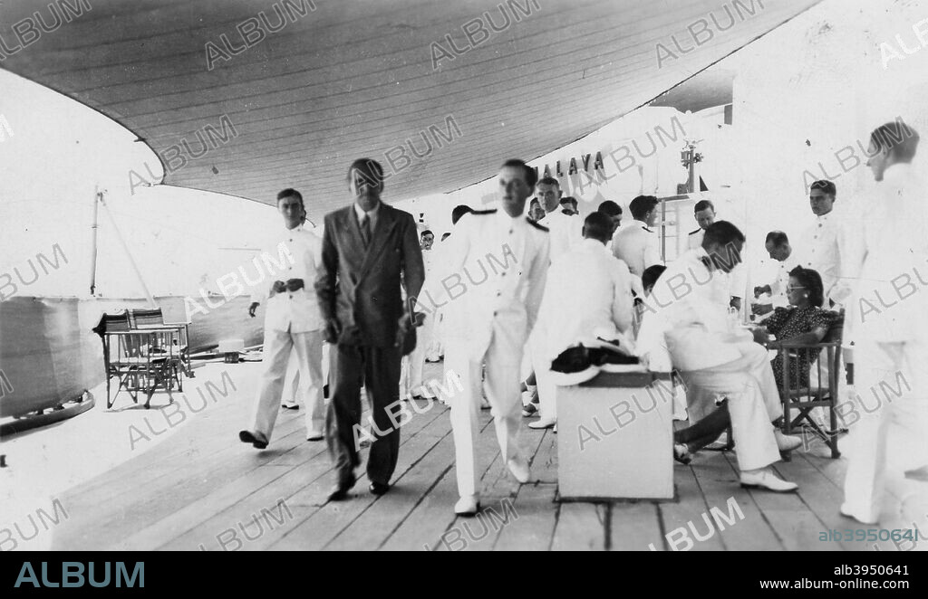 American actor and film director Douglas Fairbanks, Sr on board HMS 'Malaya', Venice, Italy 1938. Fairbanks (1883-1939) on board the battleship during its visit to the city.