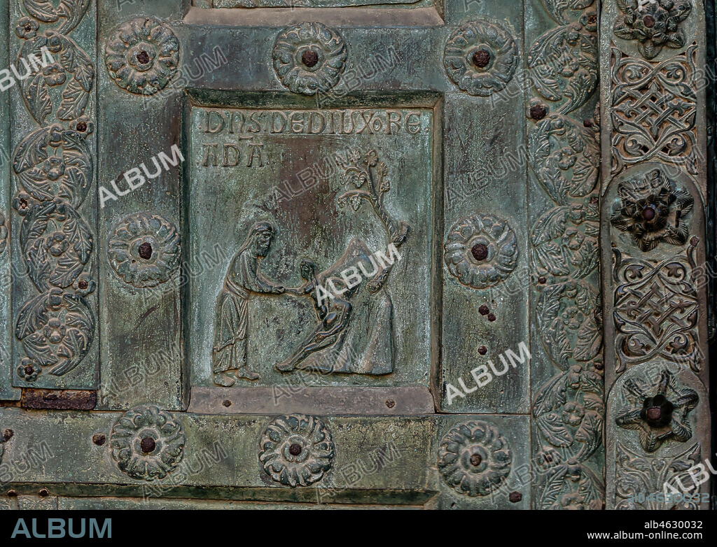 Monreale Cathedral, the gate by Bonanno Pisano (1185-6): bronze tile depicting "The creation of Eve" (scene of the Old Testament).. The gate is signed "Bonanno civis pisanus". It depicts five scenes of the Old Testament at the bottom, starting with Adam and Eve, and five scenes of the New Testament at the top, ending in "Christ and Mary in the glory of Paradise".