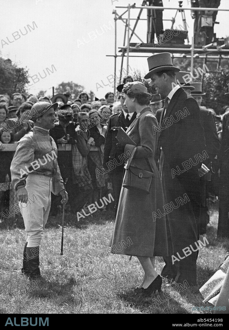 Gordon Wins Derby - Queen Sees Her Horse Come Second -- It was her week - but his day.... just before the start of the Coronation year derby her majesty the Queen chats with Sir Gordon Richards, the Jockey who rode 'Pinza' to victory.. on right is the Duke of Edinburgh. Gordon Richards achieved his life-long ambition by winning his first ever derby on 'pinza' at Epsom to-day... It is his 28-th attempt. Richards beat the Queen's horse 'Aureole' by four lengths... third was 'pink horse', ridden by Rae Johnstone. Thunderous cheers broke out over Epsom downs from the throats of over 500,000 people when her majesty with the Duke of Edinburgh drove down the famous course just prior to the race. June 06, 1953. (Photo by Paul Popper).