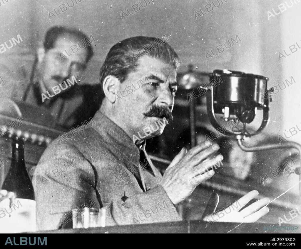 JOSEPH STALIN (1879-1953).Russian Communist leader. Stalin reporting on the draft of a new Soviet constitution from the Kremlin in Moscow, 1936.