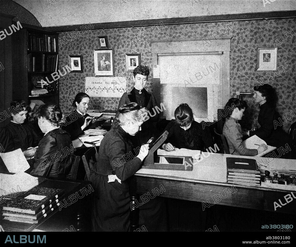 Harvard computers, circa 1890. Standing, at left: Edward Charles Pickering; seated, third from left, with magnifying glass: Antonia Maury; standing, at center: Williamina Fleming. Edward Pickering (director of the Harvard Observatory from 1877 to 1919) decided to hire women as skilled workers to process astronomical data. Among these women were Williamina Fleming, Annie Jump Cannon, Henrietta Swan Leavitt and Antonia Maury. This staff came to be known as "Pickering's Harem" or, more respectfully, as the Harvard Computers. The first woman hired was Williamina Fleming, who was working as a maid for Pickering. It seems that Pickering was increasingly frustrated with his male assistants and declared that even his maid could do a better job. Apparently he was not mistaken, as Fleming undertook her assigned chores efficiently. When the Harvard Observatory received in 1886 a generous donation from the widow of Henry Draper, Pickering decided to hire more female staff and put Fleming in charge of them. Although some of Pickering's female staff were astronomy graduates, their wages were similar to those of unskilled workers. They usually earned between 25 and 50 cents per hour, more than a factory worker but less than a clerical one.