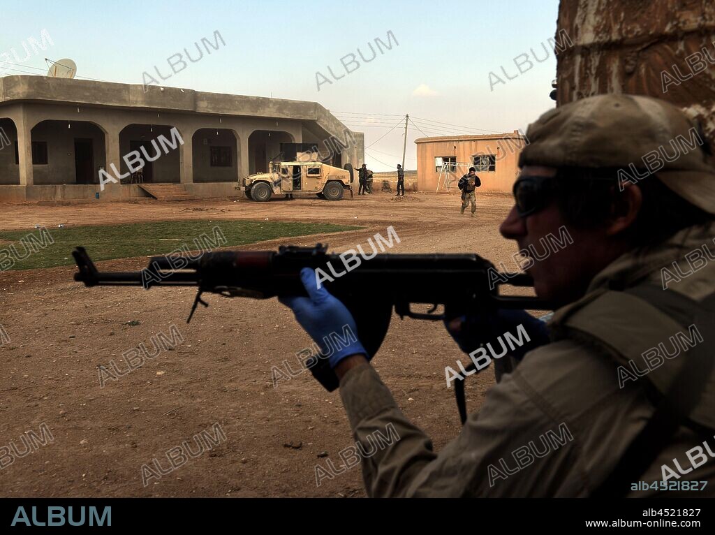 November 2, 2019, Tel Tamir, Syria: Humanitarian group Free Burma Rangers on a rescue mission of Kurdish YPG soldiers fighting Turkish forces on a road from Tel Tamir at the front line. They defended themselves from fierce gunfire, 6 tank rounds and an RPG attack to rescue a soldier with internal injuries. His friend was heard to say in the ambulance that he would blow himself up if his friend died and appeared succumbing to the fear of battle. (Credit Image: © Carol Guzy/ZUMA Wire). 02/11/2019