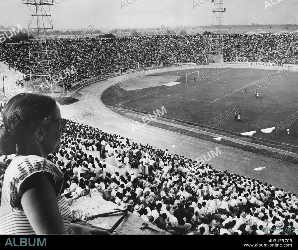The Congo Goes Modern -- The King Baudouin stadium at Leopoldville is the Centre of spectator sports in the Belgian Congo. With a seating capacity of some 70,000. The Huge Arena is the setting for soccer, a popular sport watched regularly by Enthusiastic fans from surrounding regions. October 23, 1953. (Photo by United Press).