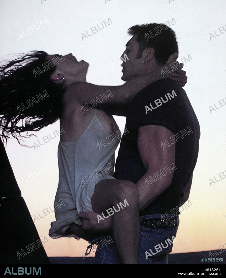 JAVIER BARDEM and PENELOPE CRUZ in JAMON JAMON, 1992, directed by JUAN JOSE BIGAS LUNA. Copyright LOLAFILMS.