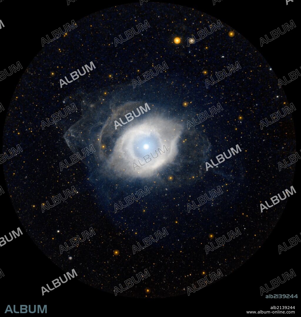NGC 7293, better known as the Helix nebula. The Helix is the nearest example of a planetary nebula, which is the eventual fate of a star, like our own Sun, as it approaches the end of its life. GALEX. (Photo by: Universal History Archive/UIG via Getty Images).