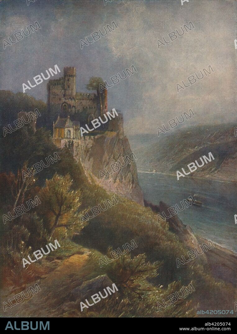 'Burg Rheinstein', (Rheinstein Castle), 1923. Castle near the town of Trechtingshausen in Rhineland-Palatinate, Germany. Constructed in about 1316/1317. Rheinstein Castle was important for its strategic location. From "Bilder vom Rhein", by Nikolai of Astudin. [Hoursch & Bechstedt., Köln, 1923].