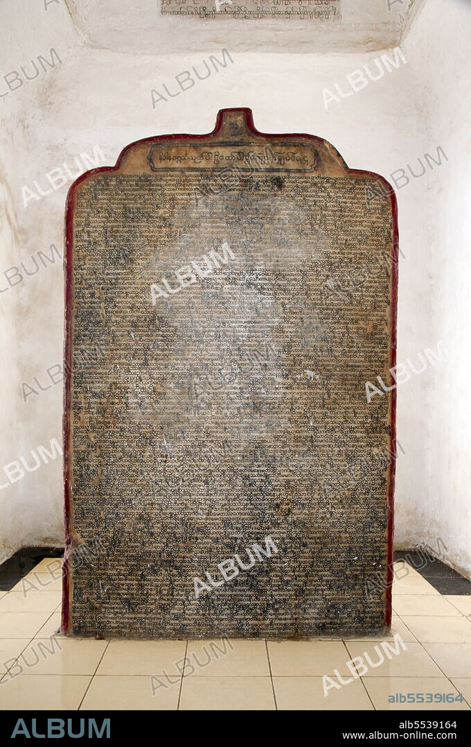 The entire Tipitaka Pali canon of Theravada Buddhism is set on 729 marble slabs, each with 80 to 100 lines of text, originally in gold ink, on both the obverse and the reverse sides. Each stone is three and a half feet wide, five feet tall and five inches thick and housed in a <i>kyauksa gu</i> or a small cave-like stupa. Kuthodaw Pagoda, literally meaning Royal Merit Pagoda, and formally titled Mahalawka Marazein, is a Buddhist temple and stupa located in Mandalay, central Burma. It lies at the foot of Mandalay Hill and was built during the reign of King Mindon (1808—78). The stupa itself, which is gilded above its terraces, is 57 m (188 ft) high, and is modelled after the Shwezigon Pagoda at Nyaung-U near Bagan. In the grounds of the pagoda are 729 'kyauksa gu' or stone-inscription caves, each containing a marble slab inscribed on both sides with a page of text from the Tipitaka, the entire Pali Canon of Theravada Buddhism. The stone inscriptions are considered to be the largest book in the world. Mandalay, a sprawling city of more than 1 million people, was founded in 1857 by King Mindon to coincide with an ancient Buddhist prophecy. It was believed that Gautama Buddha visited the sacred mount of Mandalay Hill with his disciple Ananda, and proclaimed that on the 2,400th anniversary of his death, a metropolis of Buddhist teaching would be founded at the foot of the hill.