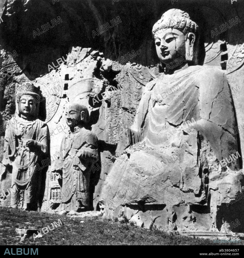 Fengxian, or Feng Xian Si, or Li Zhi cave is the Ancestor Worshipping Cave, which is the largest of all caves carved on the west hill built between 672 and 676 for Empress Wu Zetian. The carvings are claimed to be the ultimate in architectural perfection of the Tang dynasty. The shrine inside the cave measures 127 feet x 115 feet . It has the largest Buddha statue at the Longmen Grottoes. Of the nine huge carved statues, the highly impressive image of Vairocana Buddha is sculpted on the back wall of the Fengxian. The image is 57 feet high. An inscription at the base of this figure gives 676 as the year of carving. The Lung-men Caves are a large-scale grouping of Buddhist cave temples located south of the city of Lo-yang in China. They are considered one of the finest examples of Chinese Buddhist art. The caves were carved into rocky cliff faces on both banks of the Yi River. There are as many as 100,000 statues of Buddha, bodhisattvas, and other figures within the 1,400 caves, ranging from an 1 inch to 57 feet  in height. The construction of the caves began after Emperor Hsiao-wen of the Northern Wei dynasty had transferred the capital from P'ing-ch'eng to Lo-yang in 494 and continued over 400 year period into the late T'ang dynasty (618-907). In 2000 the site was inscribed upon the UNESCO World Heritage List as "an outstanding manifestation of human artistic creativity,".