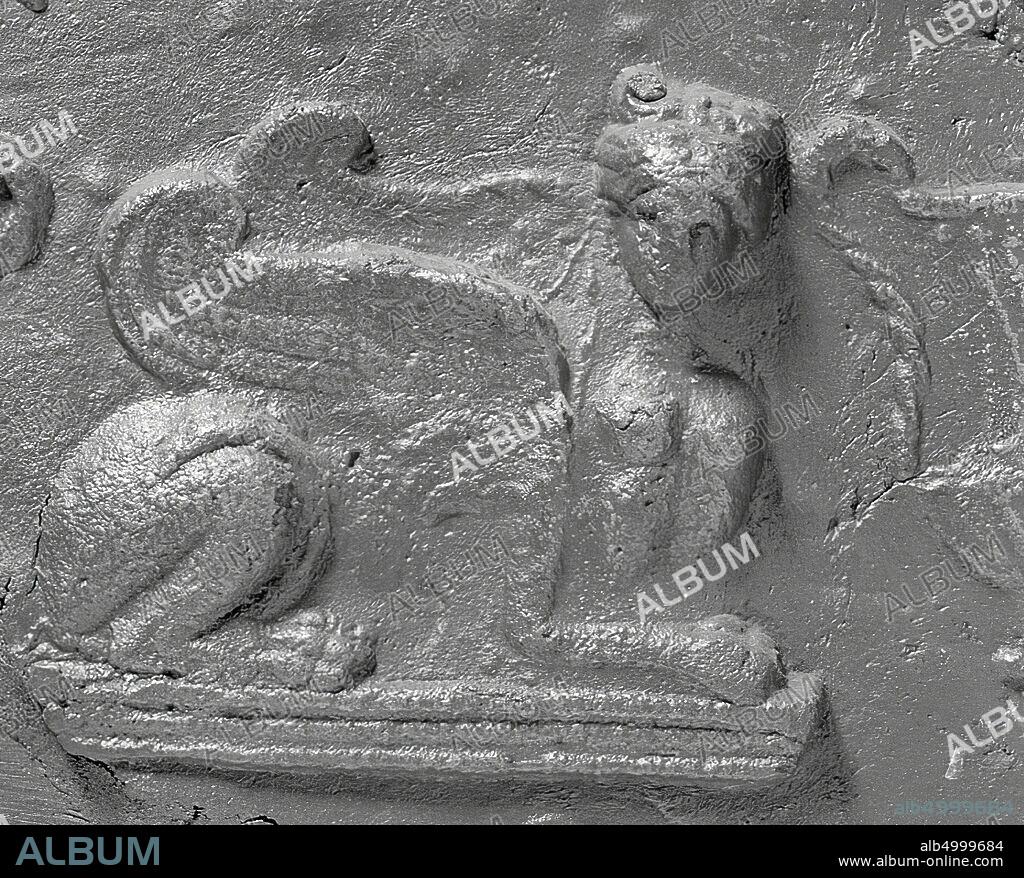 An oblong square sarcophagus of lead with semi-cylindrical curved lid. The undersides are very damaged. The object is beautifully decorated with repeating leaf motifs, lines, dolphins, pillars and rosettes., Sarcophagus, metal, lead, H 48 cm, W 43 cm, L 170 cm, Roman Period 100-300 ad, Lebanon.