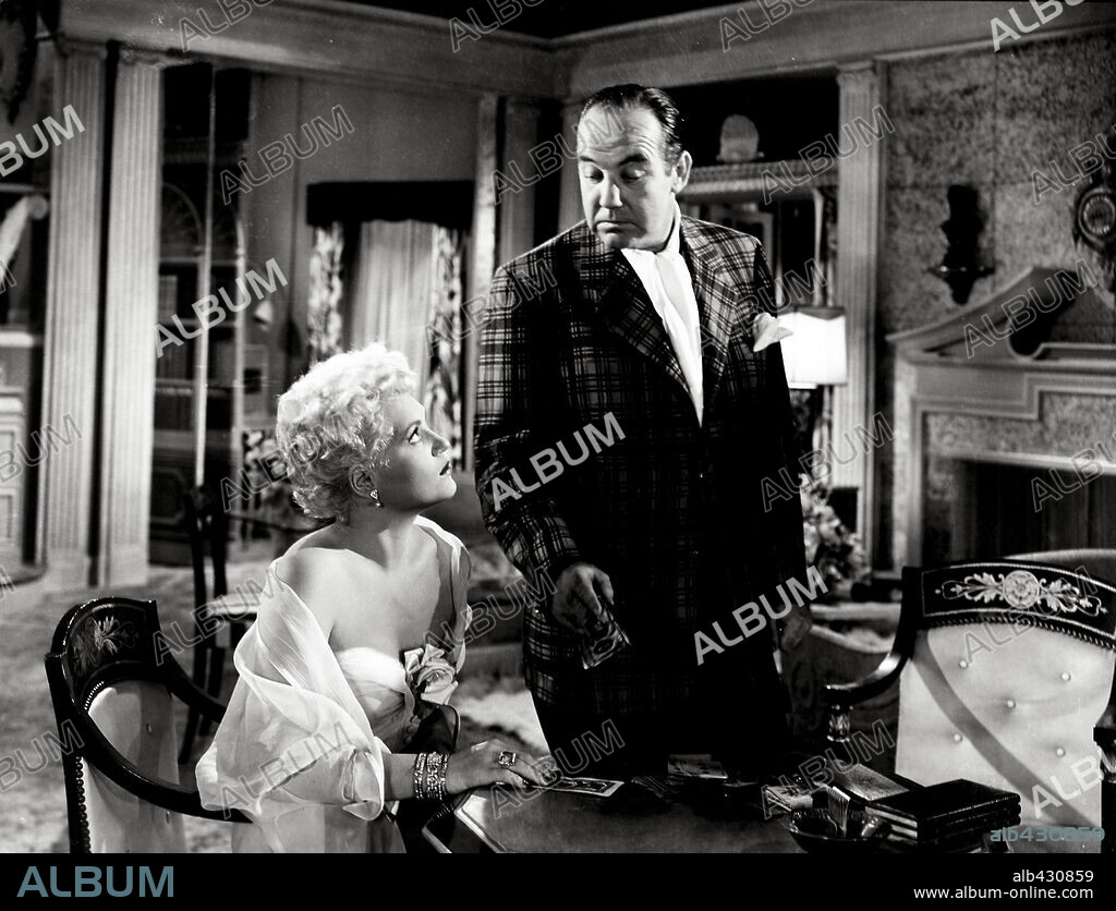 BRODERICK CRAWFORD and JUDY HOLLIDAY in BORN YESTERDAY, 1950, directed by GEORGE CUKOR. Copyright COLUMBIA PICTURES.
