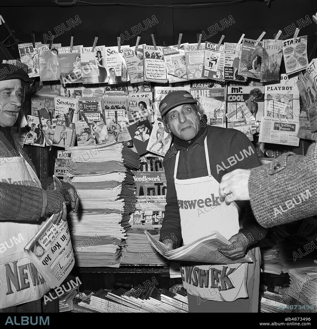 NEW YORK 1960-12-01. Newspaper salesman on 42nd Street in New York. Photo: TT Historical / Code 1902.