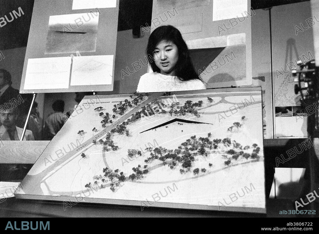 Architect Lin, in 1981, displaying her model for the Vietnam memorial. Maya Ying Lin (October 5, 1959) is an American architectural designer and artist who is known for her work in sculpture and landscape art. In 1981, at age 21 and while still an undergraduate, she won a public design competition for the Vietnam Veterans Memorial, beating out 1,441 other competition submissions. The black cut-stone masonry wall, with the names of fallen soldiers carved into its face,was completed in late October 1982 and dedicated on November 13, 1982. The wall is granite and V-shaped, with one side pointing to the Lincoln Memorial and the other to the Washington Monument. She owns and operates Maya Lin Studio in New York City, and went on to design other structures, including the Civil Rights Memorial in Montgomery, Alabama (1989) and the Wave Field at the University of Michigan. In 2005, she was elected to The American Academy of Arts and Letters, as well as the National Women's Hall of Fame.