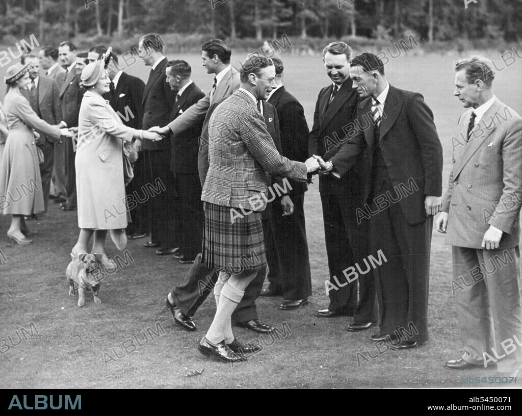 "Aussies" At Balmoral -- The King and Queen and Princess Margaret, extreme left, seen greeting Members of The Victorious Australian Test Cricketing side on the Lawns of the Balmoral Castle, Scotland, September 19. The King, wearing Kilt, is shaking hands with Don Tallon; The Queen with Keith Miller. Introducing Princess Margaret to the Players is their captain Don Bradman. October 08, 1948. (Photo by Associated Press Photo).