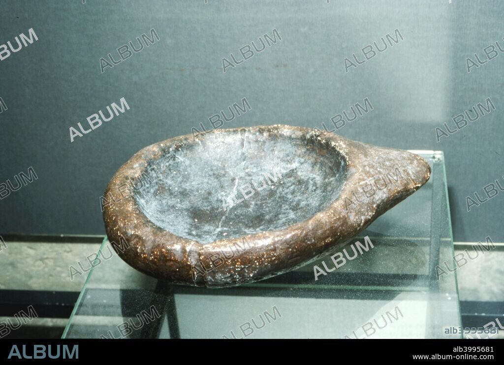 Paleolithic Stone Lamp from La Mouthe, France, 50,000-10,000BC. Paleolithic age is a prehistoric period of human history distinguished by the development of the most primitive stone tools.