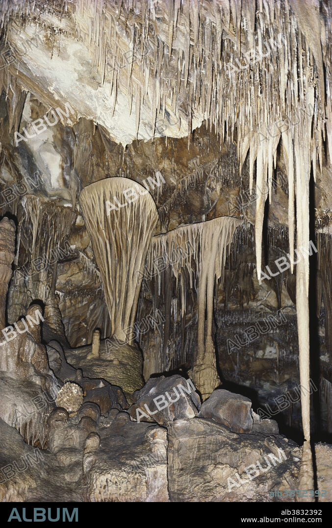 Lehman Caves in Great Basin National Park, Nevada. Collars and other lateral outgrowths develop on columns when water forces its way to the surface from inside the mineral formations here in the Grand Palace Room.