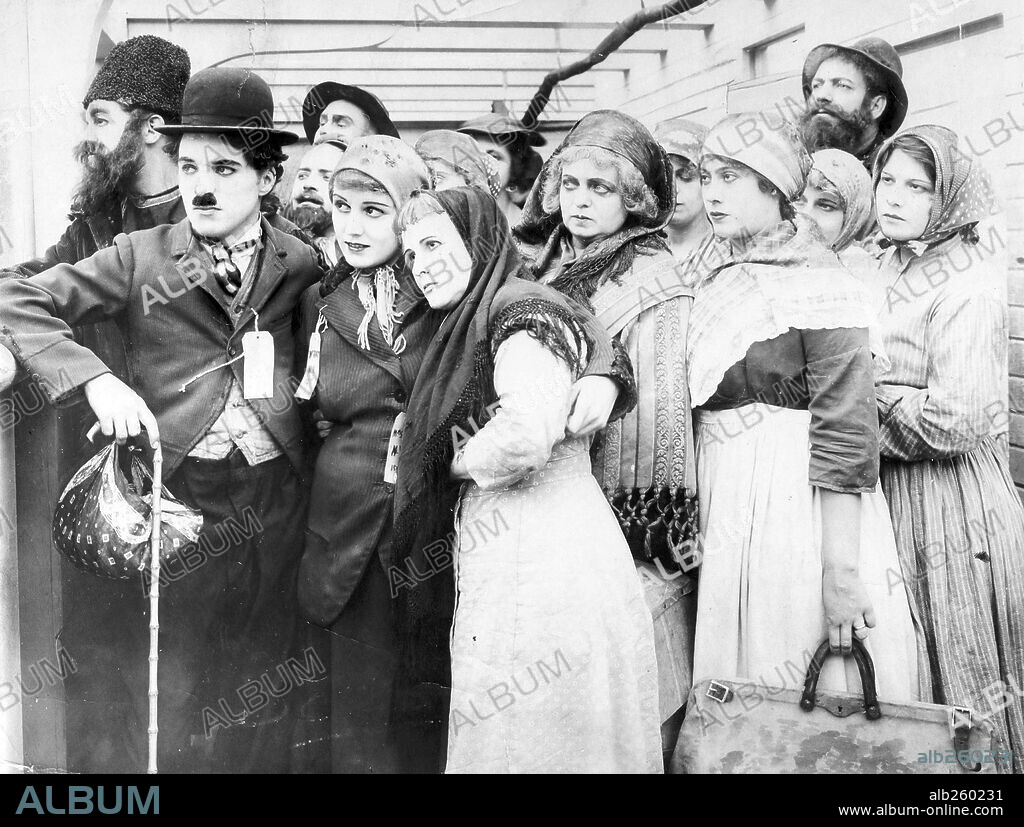 CHARLIE CHAPLIN and EDNA PURVIANCE in THE IMMIGRANT, 1917, directed by CHARLES CHAPLIN. Copyright MUTUAL FILM COMPANY.
