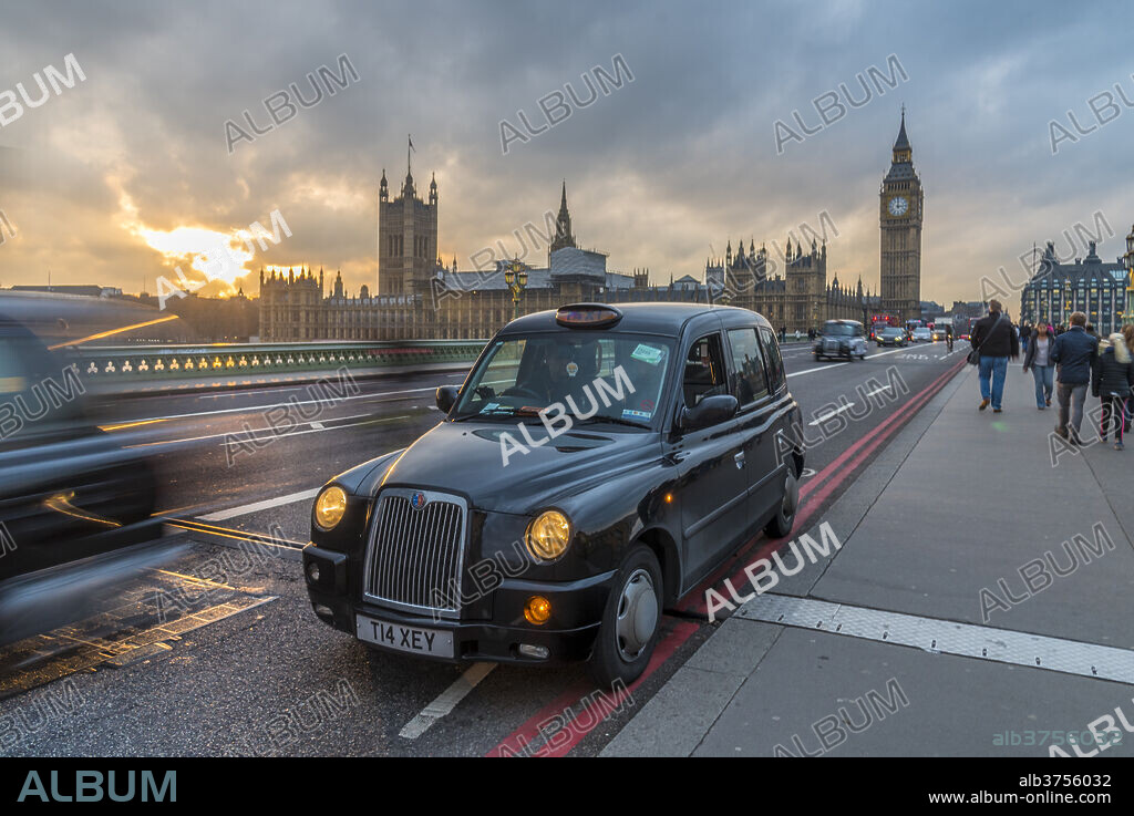 Sunset over a taxi and Big Ben on Westminster Bridge, London, England, United Kingdom, Europe.