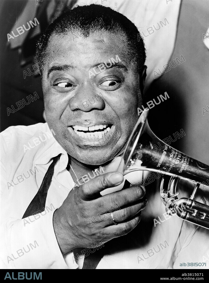 Louis Armstrong (August 4, 1901 - July 6, 1971) was an American jazz trumpeter and singer. One of the most famous musicians of the Harlem Renaissance he was born into a poor New Orleans family. He began to perform with bands in small clubs, and play at funerals and parades around town. In 1922 he was invited to move to Chicago, to play the second cornet in a Creole Jazz Band. Two years later, Armstrong moved to New York City, and began playing his music with the Fletcher Henderson Orchestra at the Roseland Ballroom. In 1929, he made his first appearance on the Broadway stage. In 1942, he married a dancer from the Cotton Club, where his band had performed many times. All throughout the 1950's and 60's, Armstrong appeared in films and made many international tours. He is one of the most appreciated jazz artists of the Harlem Renaissance, and of all times. People learned to appreciate both jazz, and African-American music even more, because of this man. Renowned for his charismatic stage presence and voice almost as much as for his trumpet playing, his influence extended well beyond jazz music. His artistry and personality allowed him socially acceptable access to the upper echelons of American society that were highly restricted for a black man. Armstrong played music up until the day he died at 70 years old, on July 6, 1971. Photographed by Herman Hiller, 1953.