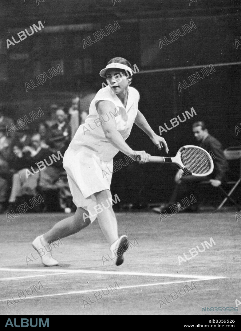 Fourth Time Champion -- Mrs. Moody won for the fourth successive year the Ladies' singles Lawn Tennis Championship at Wimbledon. August 12, 1930.
