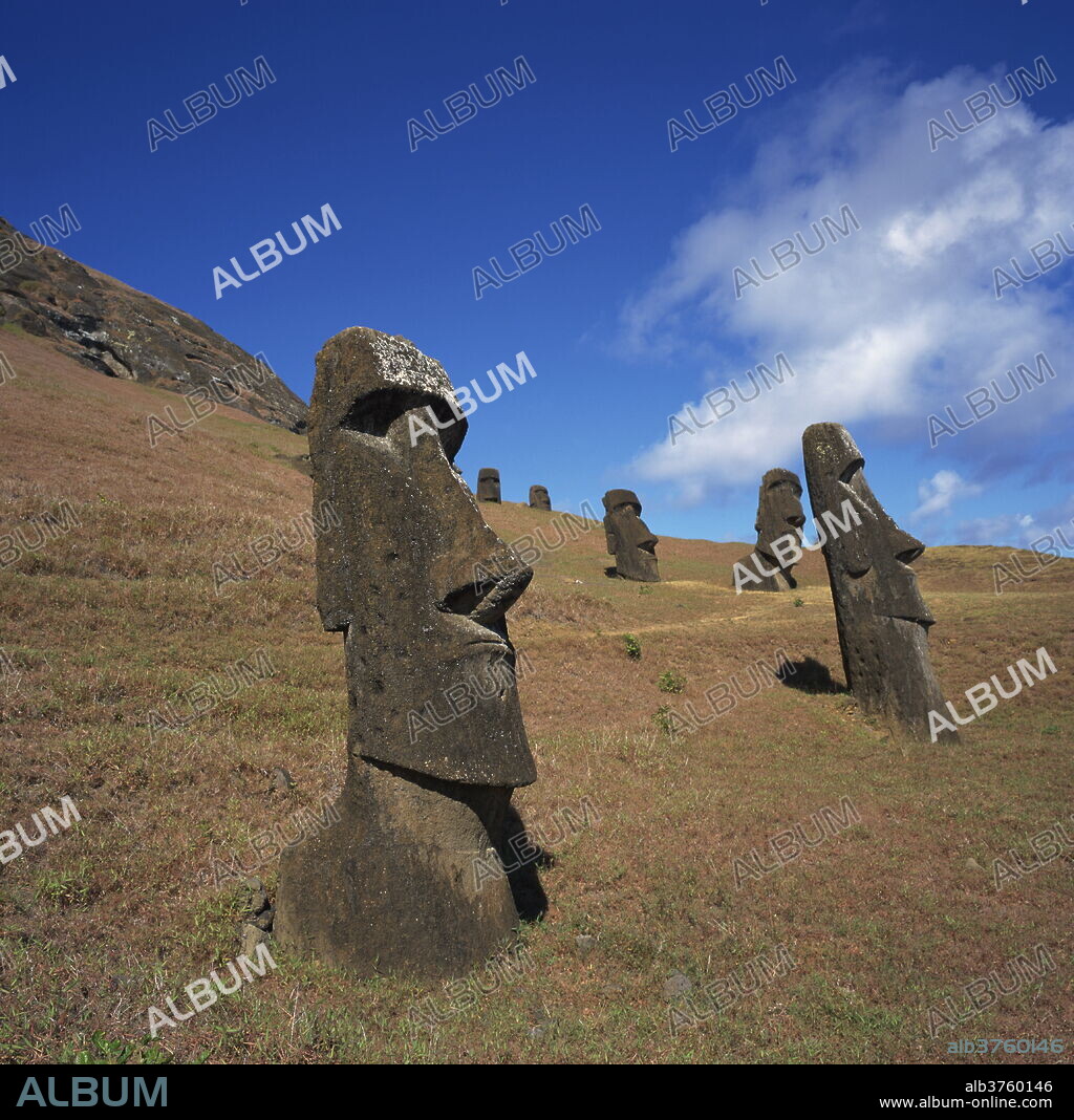 Moai statues carved from crater walls, on the southern slopes of Volcan Rano Raraku, the birthplace of the moai, Easter Island (Rapa Nui), UNESCO World Heritage Site, Chile, South America.