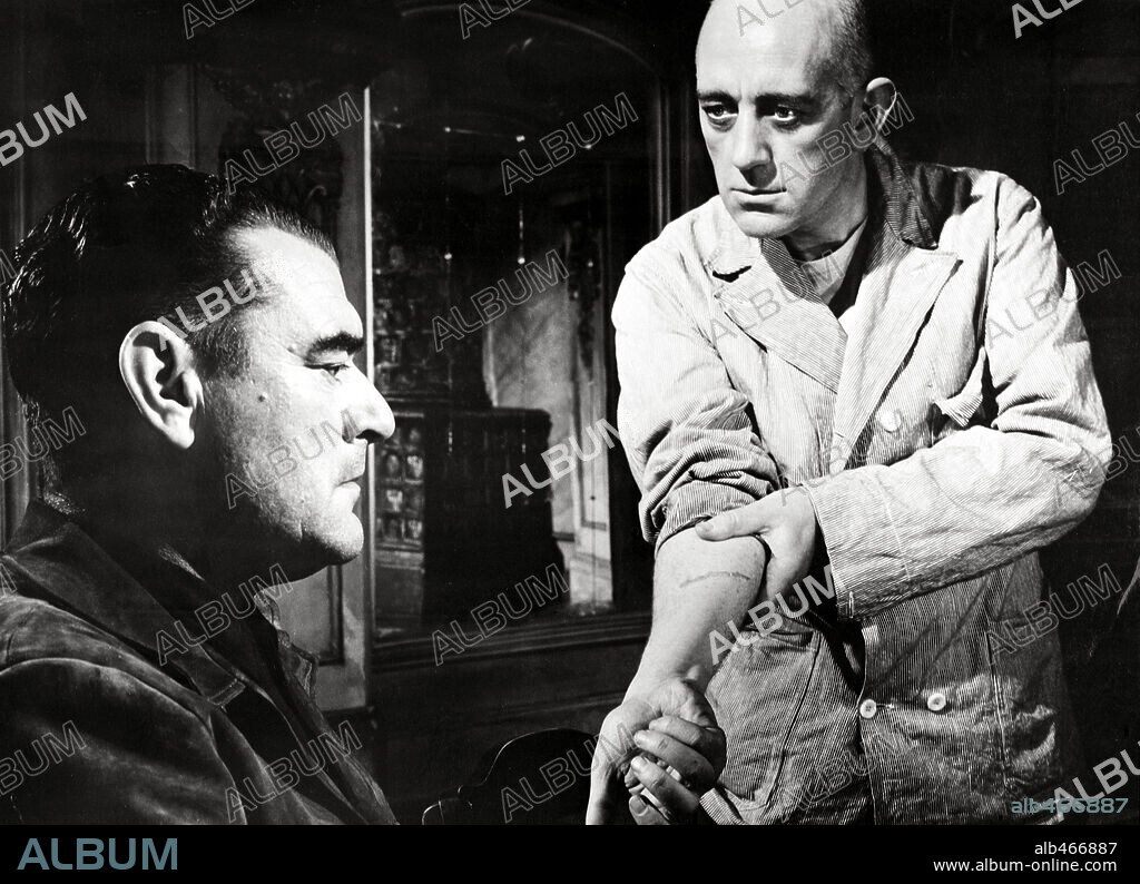 ALEC GUINNESS und JACK HAWKINS in THE PRISONER, 1955, unter der Regie von PETER GLENVILLE. Copyright COLUMBIA PICTURES.