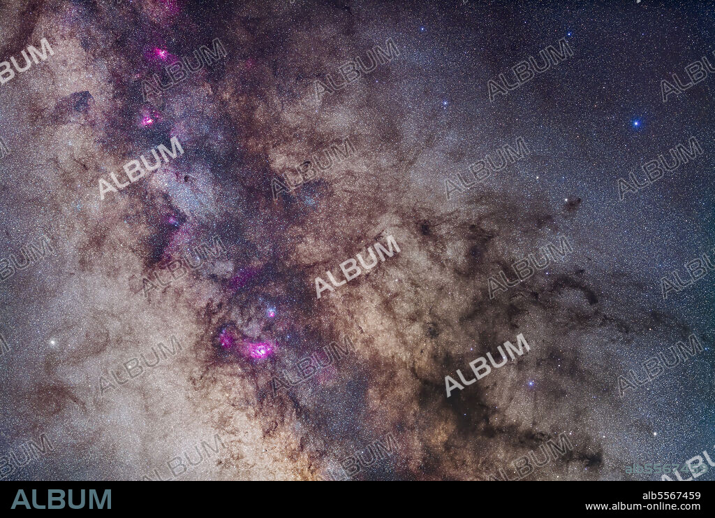 A mosaic of the region around the Small Sagittarius Star Cloud and Dark Horse dark nebula complex. The field takes in the Milky Way from the Lagoon Nebula at bottom to the Eagle Nebula at top left. In between from top to bottom are the Swan Nebula (M17), and the Small Sagittarius Star Cloud (M24). Flanking the bright M24 star cloud are the large open clusters M23 (right) and M25 (left). At bottom left is the M22 globular star cluster. The prominent dark nebula at right is the large Pipe Nebula (B78) with the small Snake Nebula (B72) above it. The whole complex is visible to the naked eye as the Dark Horse Nebula.
