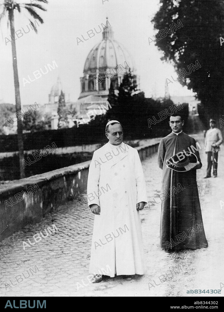 Latest Photograph just received in London ***** Vatican City. Rome.Our interesting picture shows - Pope Pius XI his daily walk in Vatican Gardens. January 01, 1932. (Photo by Photopress).