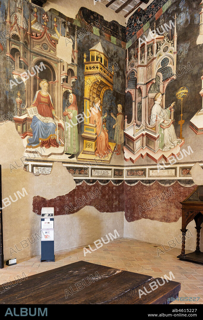 Foligno, Trinci Palace: The Hall of Liberal Arts and Planets. In this hall the symbolic figures of the seven planets are represented (Moon, Mars, Mercury, Jupiter, Venus, Saturn, Sun) following the order of the days of the week. Each planet oversees a phase of human life that is depicted inside concentric disks where in the middle zone, the Air, the Sun and the Moon define a specific time of day. On the north wall of the Hall the Arts of Trivio (Grammar, Dialectic, Rhetoric) and of the Quadrivium (Arithmetic, Music, Geometry and Astronomy) were depicted, according to a hierarchical order of learning that leads to the point of arrival of all human knowledge, Philosophy , which triumphs in the center of the wall opposite the window. Each planet influences a phase of human life, at each stage of human life corresponds, in the learning scale, a different discipline, each discipline is similar, for its properties, to one of the celestial spheres. The decoration is entrusted to Gentile da Fabriano, the greatest exponent of international Gothic in Italy, with aids (Jacopo Bellini, Paolo Nocchi, Francesco Giambono from Bologna and Domenico da Padova's Battista), and realized the 1411 and 1412 trails. Detail, from the left, of Rhetoric, Arithmetic and Astronomy.