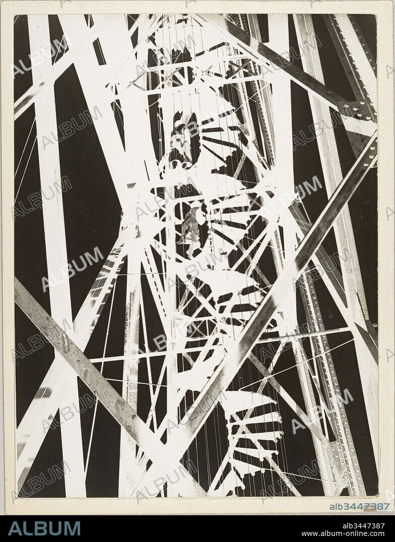 LÁSZLÓ MOHOLY-NAGY. Pont Transbordeur, Marseille, 1929, Gelatin silver print, Image: 23.7 x 17.9 cm (9 5/16 x 7 1/16 in.), Photographs, László Moholy-Nagy (American (born Hungary), Borsod 1895–1946 Chicago, Illinois), In 1929 Moholy-Nagy traveled to Marseilles, where he photographed the Pont Transbordeur, a steel transporter bridge that was celebrated, like the Eiffel Tower, as an icon , of modern construction. Like a number of other avant-garde photographers, including Germaine Krull, Herbert Bayer, and Florence Henri, Moholy-Nagy was fascinated by the dynamic spatial relations of the bridge's crisscrossing steel girders and open spiral staircase.