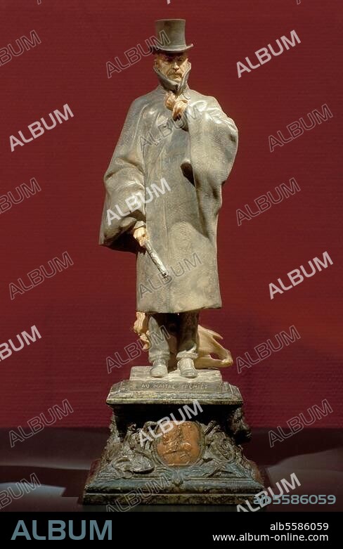Fremiet, Emmanuel; franz. Bildhauer. Paris 6.12.1824 - ebd. 10.9.1910. "Emmanuel Fremiet". Skulptur, 1908, von Henri Greber (1854-1941). Marmor und Bronze, 48 × 18 × 13 cm. Beauvais, Musée Départemental de l'Oise.